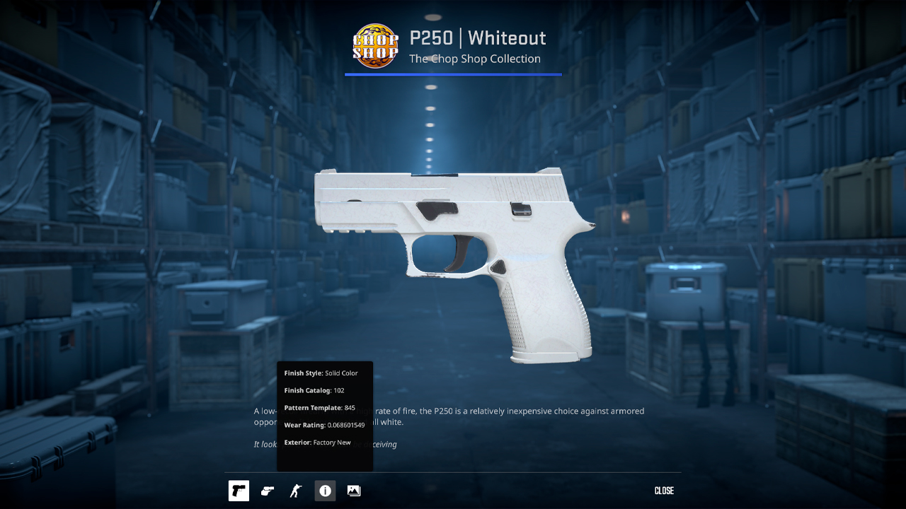 White P250 pistol on workbench